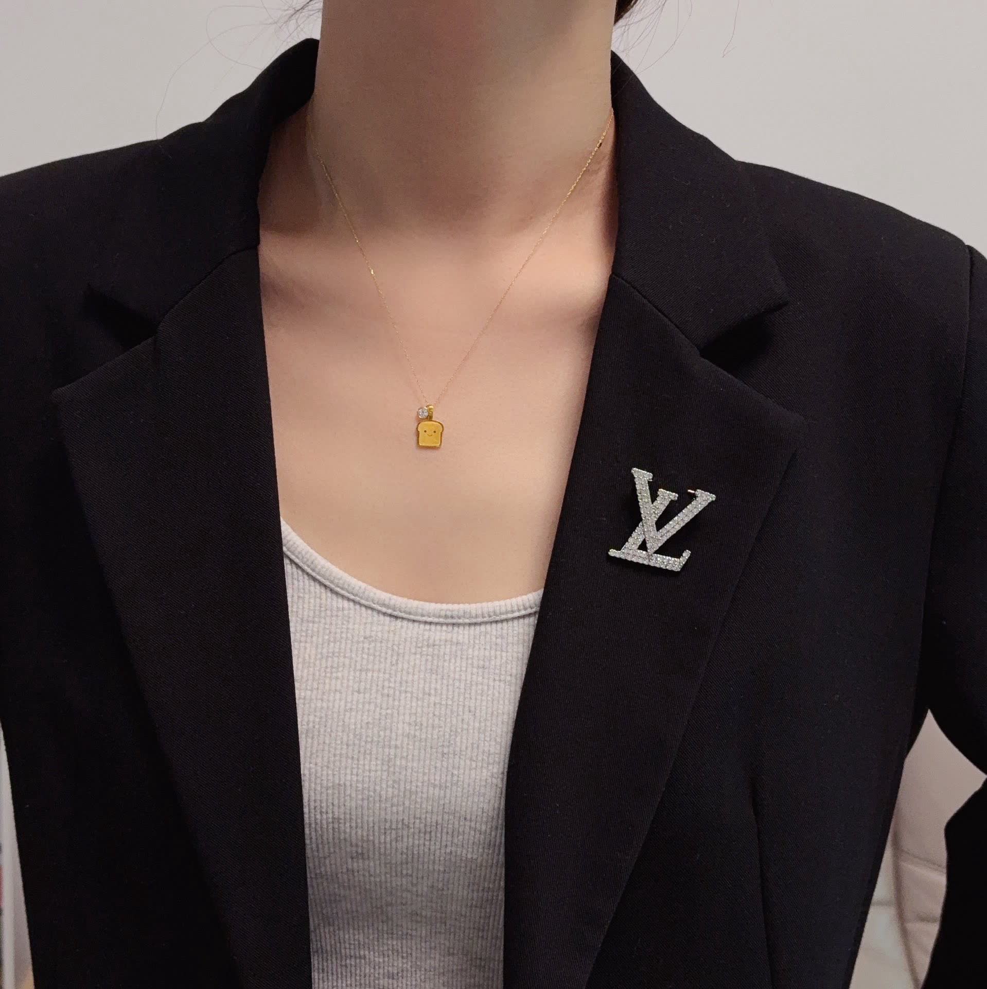 Louis Vuitton Silver Tone 'LV' Logo Brooch